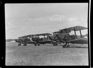 Tiger Moth aircrafts standing in formation, location unidentified