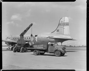 Pan American World Airways, unloading freight with a mobile crane, Whenuapai Aerodrome, Auckland