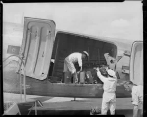 New Zealand National Airways Corporation, loading luggage onto a Dakota, Whenuapai Aerodrome, Auckland
