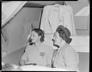Pan American World Airways courtesy flight, Miss Francis Williams and Mrs Constance Lendrum enjoying view from aircraft
