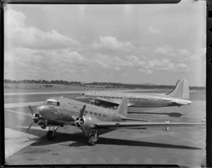New Zealand National Airways Corporation, Dakota, Pio Pio, (in foreground) and Trans Australia Airlines, DC-4, Thomas Mitchell, Whenuapai Aerodrome, Auckland