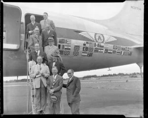 Unidentified businessmen, arriving by the airplane NC37734 Atlas Sky Merchant, Whenuapaui Air Base, Waitakere City, Auckland