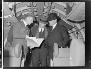 John Gamble and unidentified man with Fred Jones, Minister of Defence on board Handley Page Hastings airplane