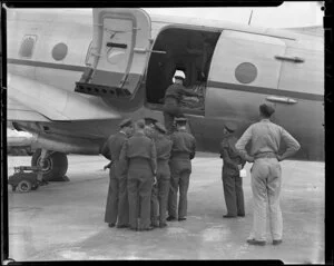 Members of the 41st Squadron, Royal New Zealand Air Force, planning for Handley Page Hastings airplane flight, Whenuapai aerodrome, Waitakere City