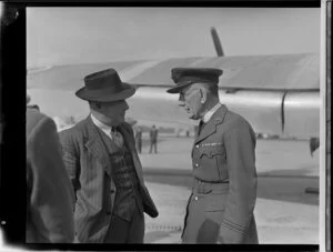 Mr Geoff Roberts, Manager, Tasman Empire Airways limited, left, with Flight Lieutenant Allerton, Whenuapai aerodrome, Waitakere City