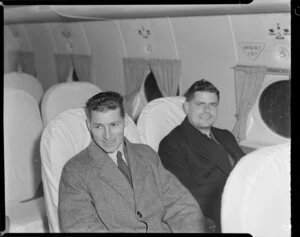 I H Driscoll and Harry Yates, NAC, seated in aeroplane, BCPA [British Commonwealth Pacific Airlines] inauguration, Whenuapai