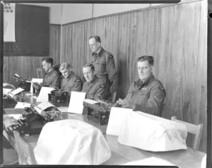 Sergeant D D Whitlock instructs touch typing to LAC W W Matthews, LAC J J Thomson, LAC D J McNair, and Corporal K J Gilmour, Hobsonville Technical Training School