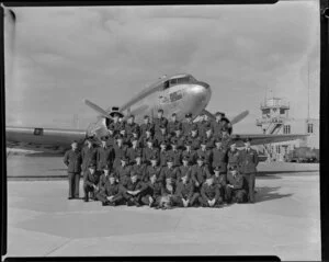 No 41 Transport Squadron group in front of the flagship, Douglas Dakota, at Whenuapai Aerodrome, Auckland
