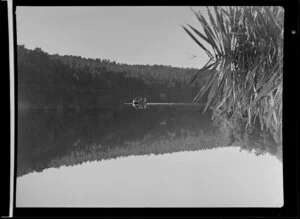 Rowing on Lake Matheson, Westland County, South Westland