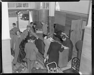 Offices of New Zealand National Airways Corporation, Manse Street, Dunedin, including unidentified customers and staff