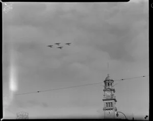 Mosquito aircrafts flying in formation over Town Hall, Auckland
