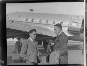 Pat Castle [Shell Oil?] and unidentified man at Royal New Zealand Air Force station, Whenuapai, Waitakere City