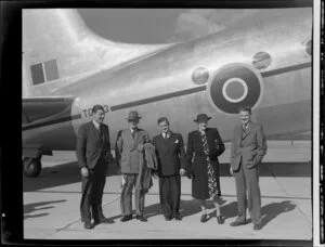 Unidentified passengers alongside Handley Page Hastings airplane, location unidentified