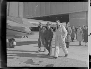 RD Brown, Mayor of Hastings, left, with unidentified man and Squadron Leader Hazelden, Royal New Zealand Air Force, at Ohakea, Whanganui District