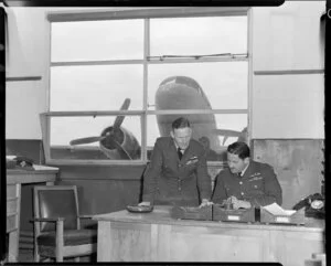 Squadron Leader A H Harding, Distinguished Flying Cross (DFC), second in command, No 41 (T) Squadron and Wing Commander J T MacLean-de Lange, (DFC), commanding officer (seated)