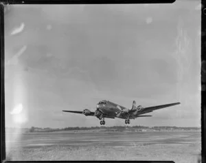 Australian National Airways airplane Arkana, taking off from Royal New Zealand Air Force station, Whenuapai, Waitakere City