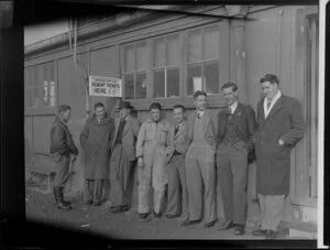 Messrs Alexander, L O Steen, S E Baff, M Langdon, R E Mowbray, W Brown, N E Marriott and R Duck outside the flight ticket office, Canterbury Aero Club