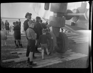 People looking at aircraft, Mission Bay, Auckland