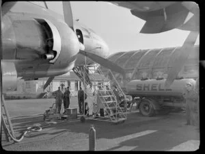 Lockheed Constellation aircraft being refuelled, Whenuapai