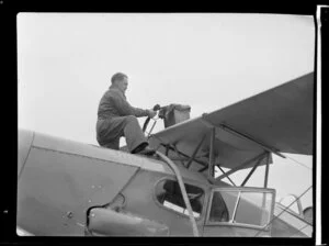 National Airways Corporation (NAC), F J Molloy, pilot, refuelling aircraft at Haast, South Westland