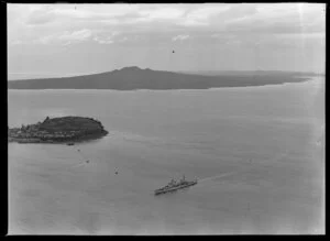 Royal Navy cruiser, HMS Bellona, passing Devonport, Auckland