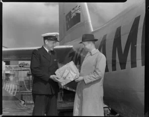 Tasman Empire Airways Limited, kiwi egg in a box with a Kiwi Polish Co Ltd label, being handed over, Auckland