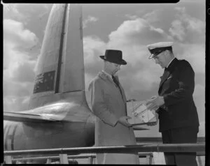 Tasman Empire Airways Limited, kiwi egg in a box with a Kiwi Polish Co (NZ) Ltd label, being handed over, Auckland