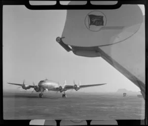 Qantas flight, BOAC (British Overseas Airways Corporation) Lockheed Constellation airplane, arriving at Mascot Airport, New South Wales, Australia