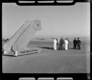 Qantas flight, BOAC (British Overseas Airways Corporation), Lockheed Constellation airplane, arriving at Mascot Airport, New South Wales, Australia