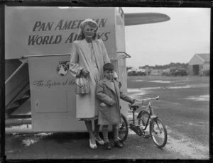 Pan American Airways passengers, Joyce Halstead and Michael with his tricycle