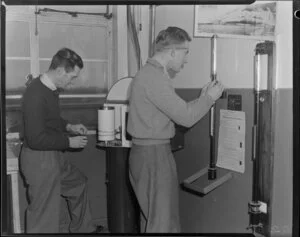 Royal New Zealand Air Force, weathermen K Brown reading the anemometer and N White reading the barometer