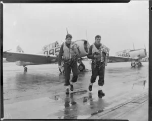 Cadet pilots A J King and C M Waters, after flight in a Harvard aircraft, Wigram, Christchurch