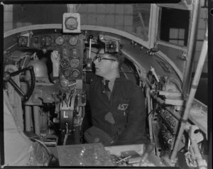 Leading Aircraftman J G Peart working on a Anson aircraft, Wigram, Christchurch