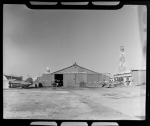 Qantas Empire Airways hangar and aircraft ZK-APU and VH-USM, Brisbane, Queensland, Australia