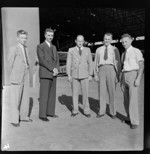 Qantas Empire Airways, from left are D Tennant, Senior Flight Captain, N A Black, Manager for Queensland, W B Grove, Works Foreman, E P Brown, Assistant Works Foreman, H W Avery, Senior Engineer, Brisbane, Australia