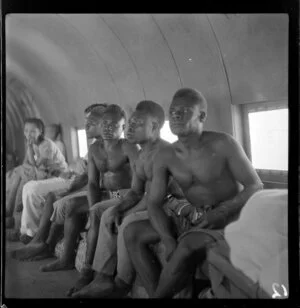 Local people on a Qantas Empire Airways flight to Manus Island, Bismarck Archipelago, Papua New Guinea