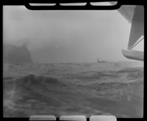 Trans Oceanic Airways Short Sunderland flying boat [on horizon?], Lord Howe Island, Australia