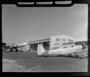 Qantas hangars, Mascot airport; Wackett trainer aeroplane in the foreground, Sydney