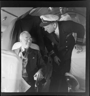 Qantas Empire Airways, Bird of Paradise Service, Captain J P Brodie talking with a passenger