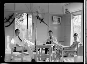 Qantas lounge at Berrimah, Northern Territory, Australia, from left are F W Brasier, H Johnstone and Mrs Hill