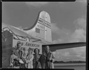 Anderson family having arrived on Douglas DC-4 NC88951 Clipper Racer aircraft [Whenuapai Royal New Zealand Air Force base?]