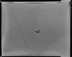Qantas Constellation Ross Smith in flight over Whenuapai Royal New Zealand Air Force base