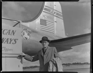 Passenger Alfred Bishop having arrived on Pan American World Airways Douglas DC-4 NC88951 Clipper Racer [Whenuapai Royal New Zealand Air Force base?]
