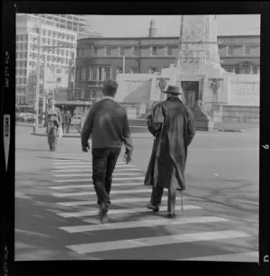 Lambton Quay, crossing the road to the Cenotaph war memorial, Wellington