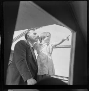 Passenger F N Gray and his young child Jennifer on Qantas Catalina flying boat service from Suva, Fiji, to Sydney, Australia