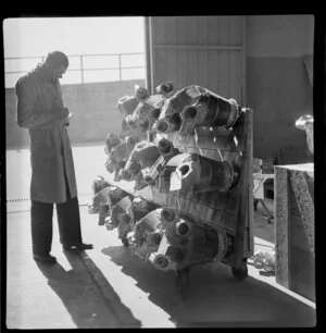 An unidentified engineer assesses aircraft parts at the Qantas workshop in Sydney, New South Wales, Australia