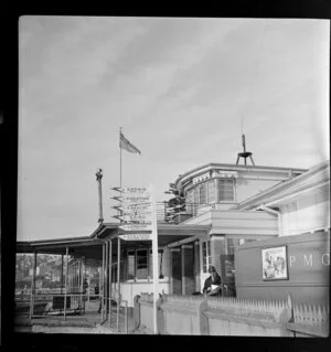 Road signs listing distances to Darwin, Singapore, Karachi, Cairo and London, Rose Bay flying-boat airbase terminal, Sydney, New South Wales, Australia