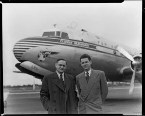 Guy Hamilton and Mr Mauritz in front of Pan American World Airways Clipper Mandarin aeroplane