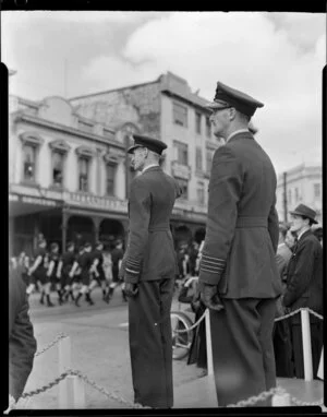 Officiers salutes soldiers at the Battle of Britian week parade, unknown location