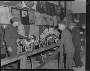 People viewing equipment at the Battle of Britain week exhibition at the Town Hall, unknown location
